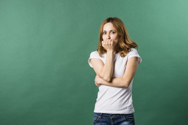 https://anilabashllari.com/wp-content/uploads/2019/06/afraid-young-woman-covering-her-mouth-against-green-backdrop_23-2148056320-1.jpg