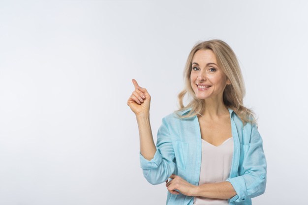 https://anilabashllari.com/wp-content/uploads/2019/06/smiling-young-woman-pointing-her-finger-against-white-background_23-2148029502-1.jpg